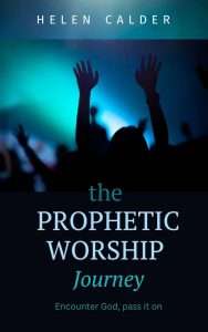 Book cover, text "The Prophetic Worship Journey" with image of people raiding hands